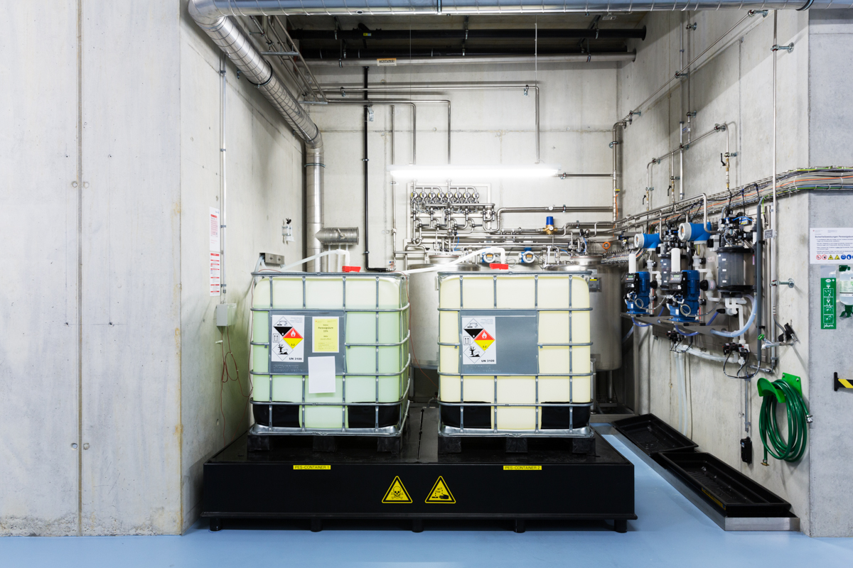 Huge tanks of disinfectant and acid used to neutralise infectious pathogens in the basement of the biohazard facility. Spiez Laboratory, Spiez, June 2017