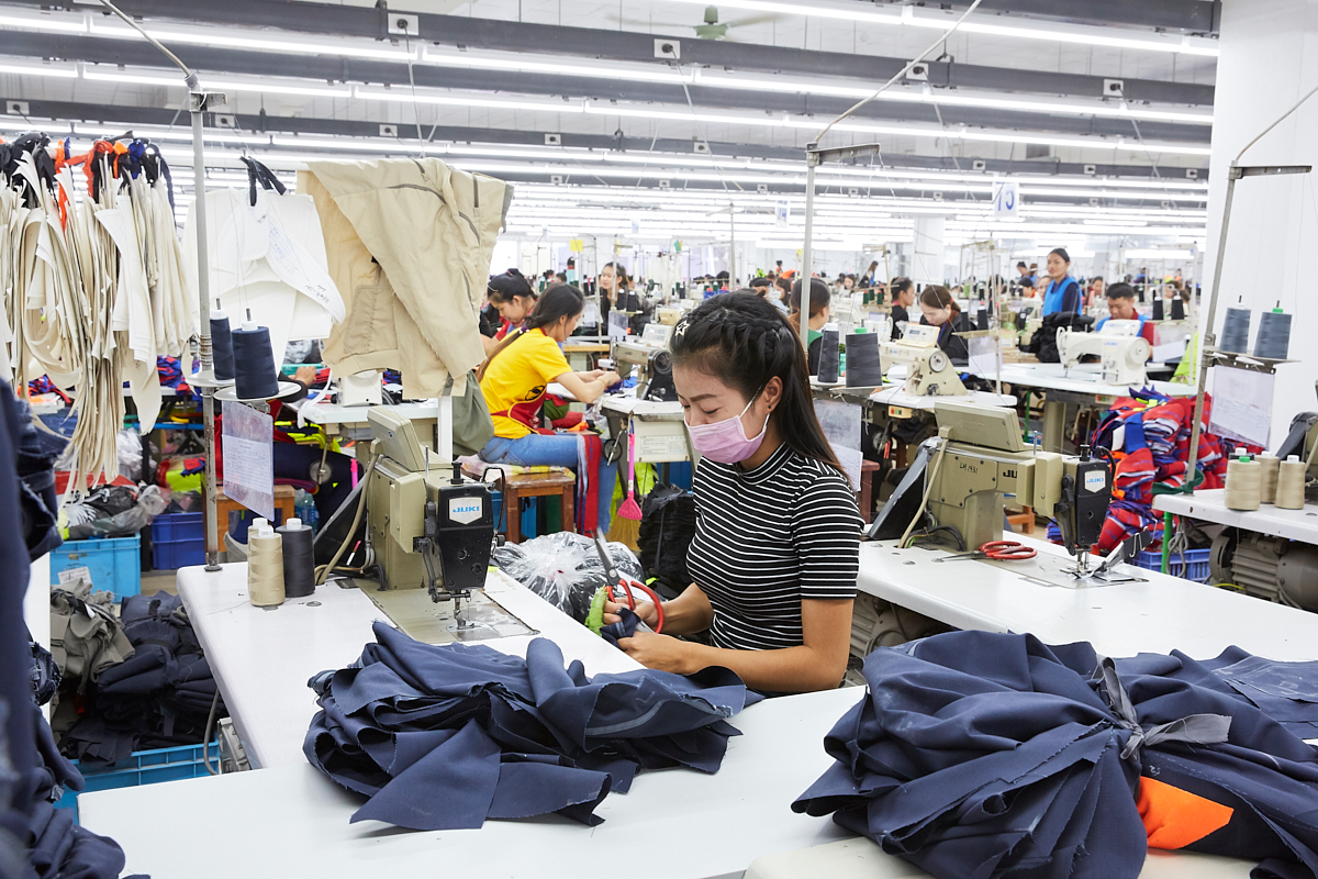 A worker at Trio (Lao) Export Co. Ltd., Lao’s largest garment factory. Laborers work eight hours a day and earn 250 USD per month. Vientiane, Laos, November 2018.