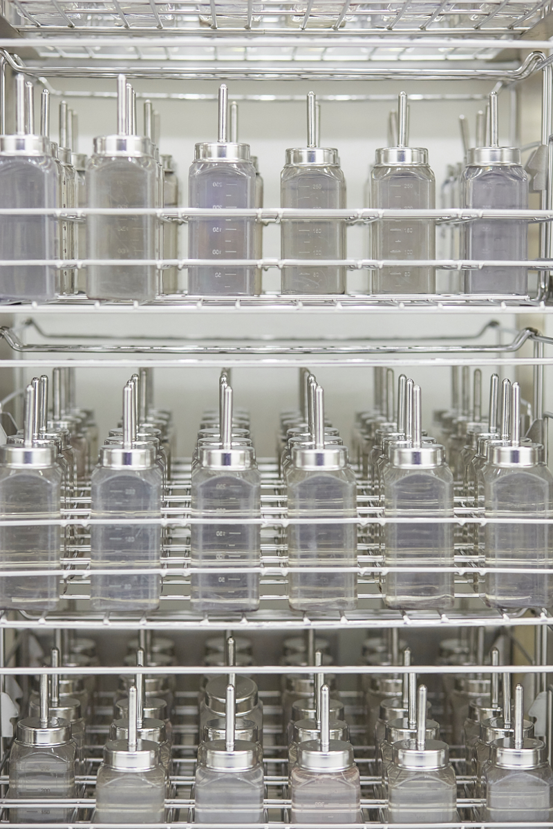 Water bottles carefully sterilized and stacked in trays. Vetsuisse Faculty, University of Zürich, October 2018.