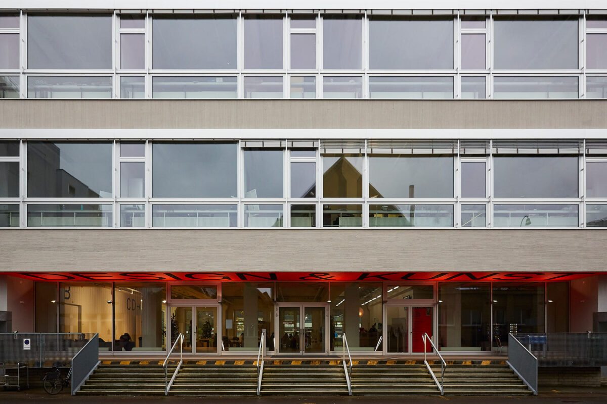  - The facade of the design and art school in the ex-Viscosuisse-areal, which is now a trendy startup businesses hub. The once powerful Viscose factory has massively reduced production capacity of industrial textiles since the 1990s. Silja Häusermann’s father has worked as a chemist for the company for almost 40 years. Viscostadt, Luzern, deccember 2019. - Copyright © © S. Borcard - N. Metraux - Zurich - Canton de Zurich - Suisse - 